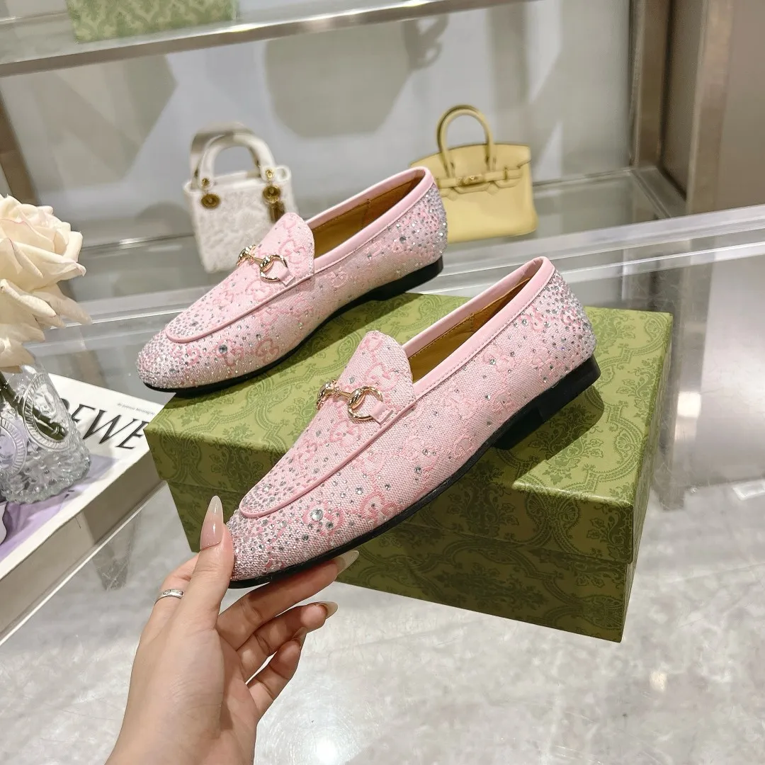 👟👟Ex-factory price 500👟👟 Genuine leather sole +50 (35-41) (41/42 customized) As an outstanding representative of Gucci’s design heritage, the Jordaan series of loafers with horsebit buckles vividly highlight the classic and elegant style. Crafted from the brand's signature monogram canvas, this shoe is timeless. Made from soft material and with a refined, smooth silhouette, these shoes are a perfect expression of everyday elegance. Gucci Angora Red GG Canvas Women Light Gold Tone Hardware Horsebit Faceted Crystal Detail Leather Sole Flat.